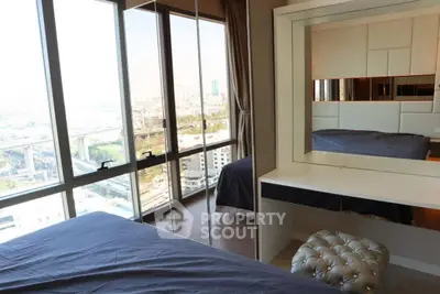 Luxurious bedroom with stunning city view and elegant decor