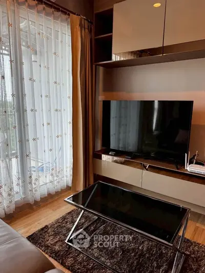 Modern living room with sleek TV setup and elegant decor