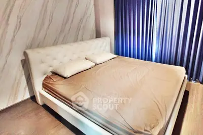 Luxurious bedroom with elegant tufted headboard and stylish decor