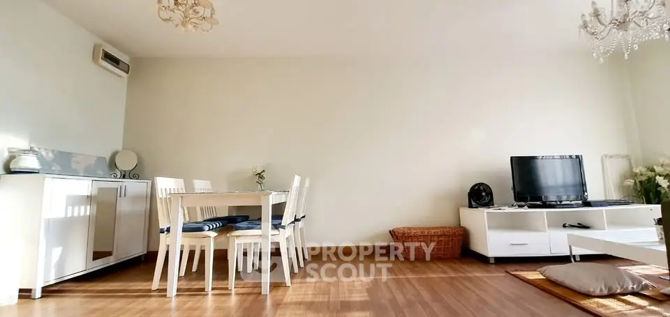 Spacious living room with elegant dining area and modern decor