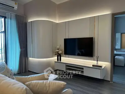 Modern living room with sleek TV setup and elegant decor