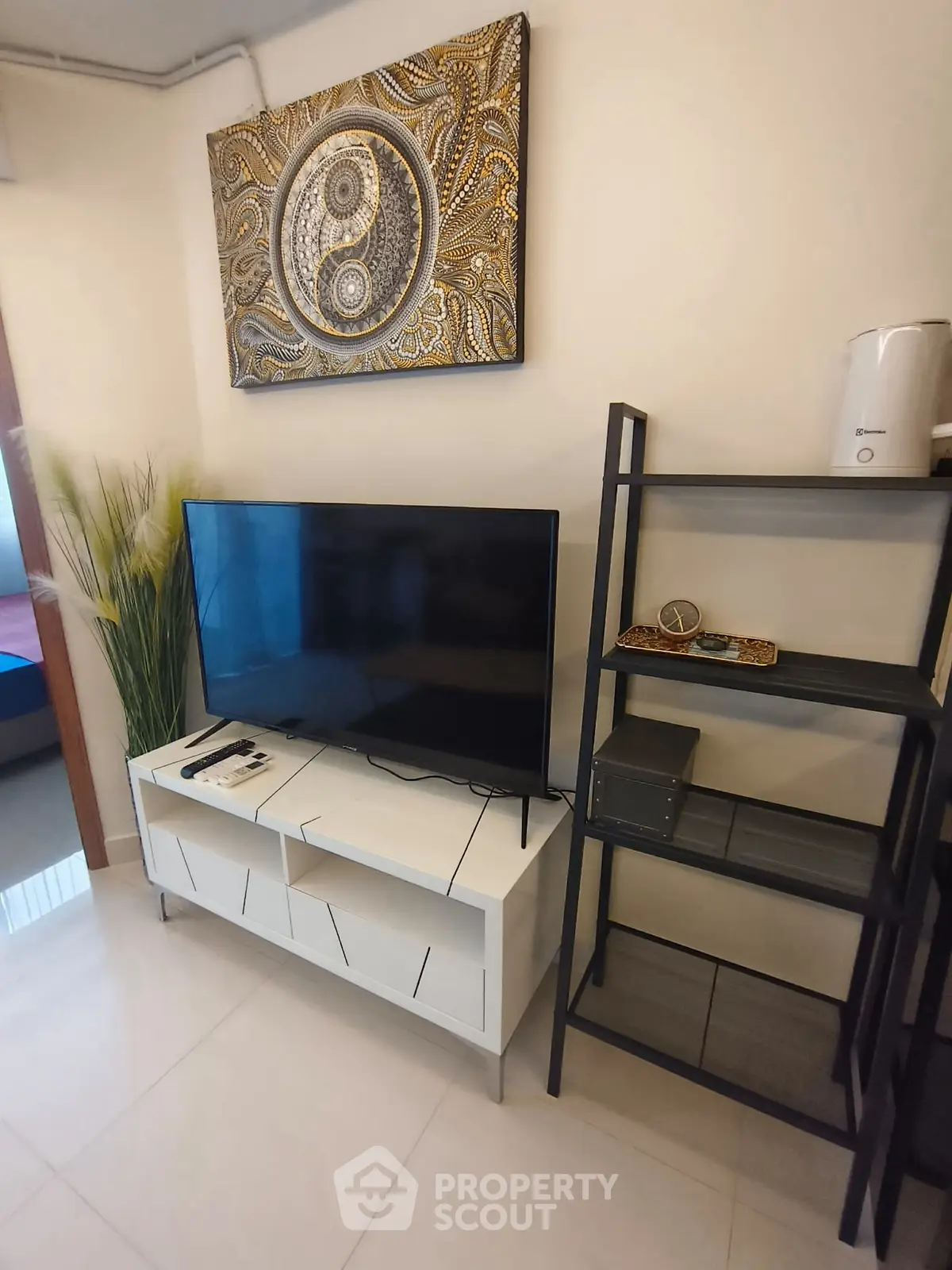 Modern living room with stylish TV setup and elegant decor