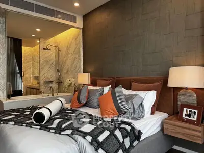 Luxurious bedroom with modern decor and ensuite bathroom view