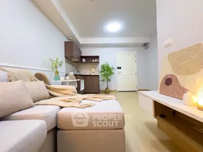 Cozy living room with modern open kitchen and stylish decor