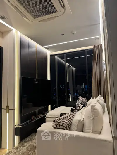 Luxurious modern living room with city view, featuring elegant lighting and plush furnishings.