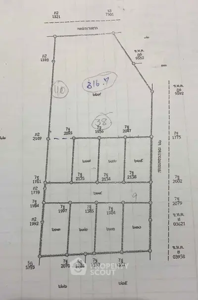Detailed schematic plan of a property layout with measurements and annotations.