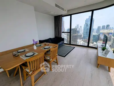 Stunning modern living room with panoramic city views and elegant dining area.