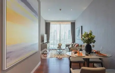 Luxurious living room with city view, elegant decor, and modern furnishings in high-rise apartment.