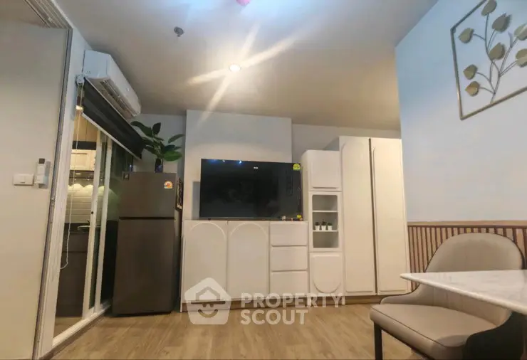 Modern living room with stylish decor and comfortable seating area.