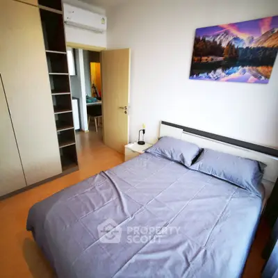 Cozy bedroom with modern decor and ample storage space