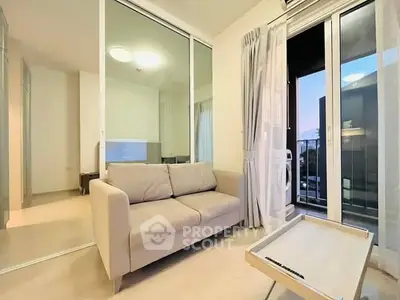Modern living room with balcony view and cozy sofa