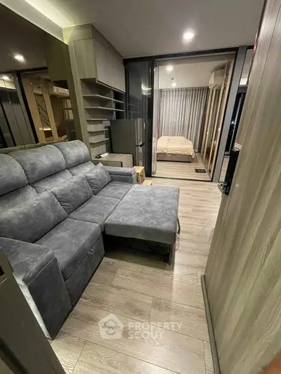 Modern apartment interior with cozy living room and stylish bedroom