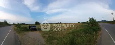 Expansive rural land with scenic views and road access, ideal for development or agriculture.
