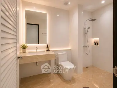 Luxurious modern bathroom with elegant fixtures and spacious shower area.