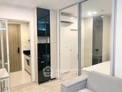 Modern apartment interior with sleek design and glass partitions