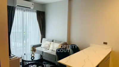 Modern living room with cozy sofa and stylish decor in a bright apartment