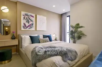Luxurious bedroom with elegant decor, plush bedding, and stylish artwork, perfect for relaxation and comfort.