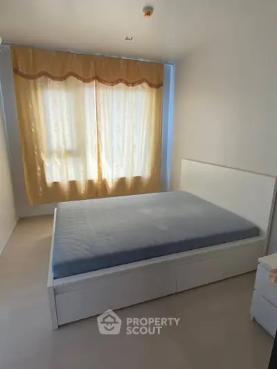 Cozy bedroom with natural light and minimalist design