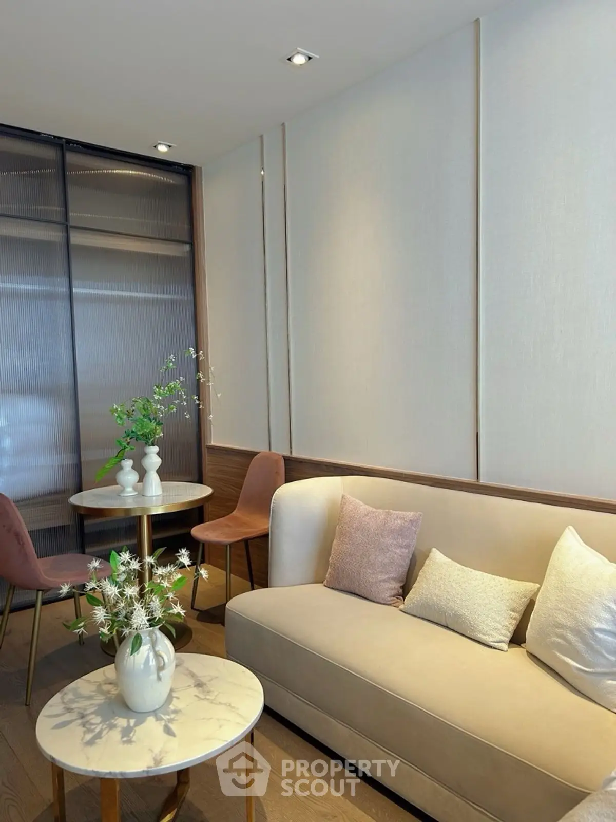 Elegant living room with modern decor and cozy seating area