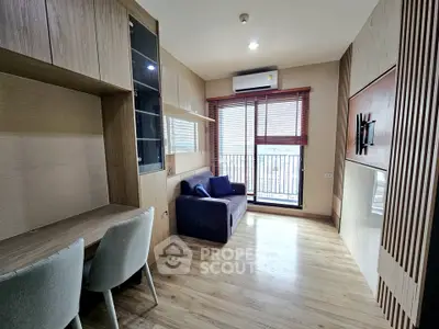 Modern living room with wooden flooring and balcony view