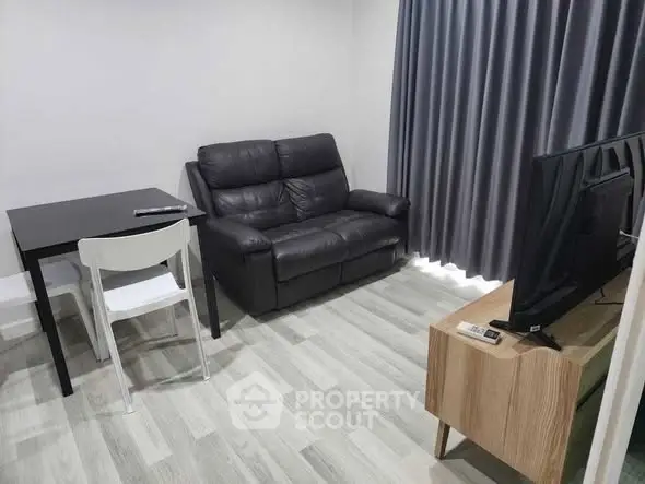 Cozy living room with modern furniture and sleek flooring