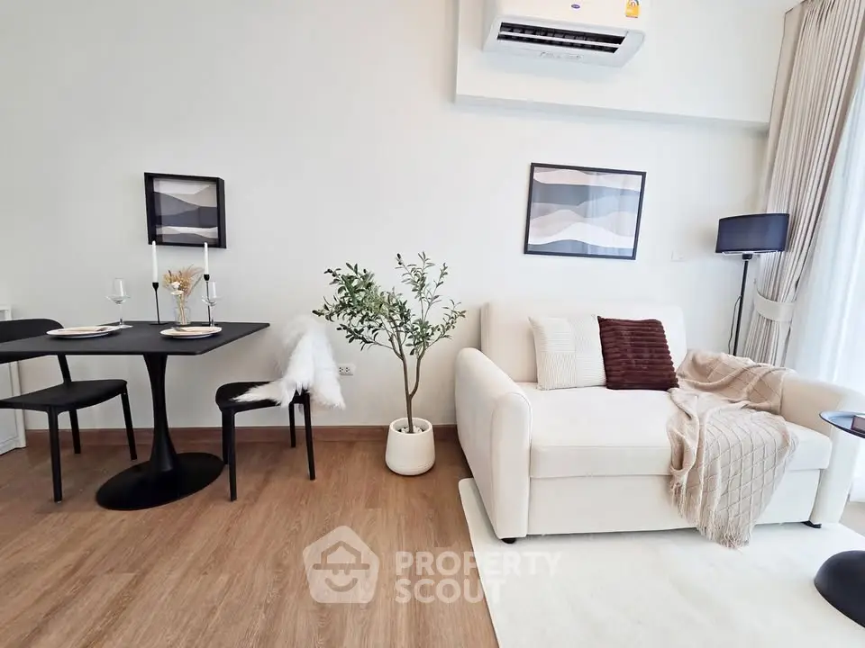 Modern living room with elegant decor and cozy seating area