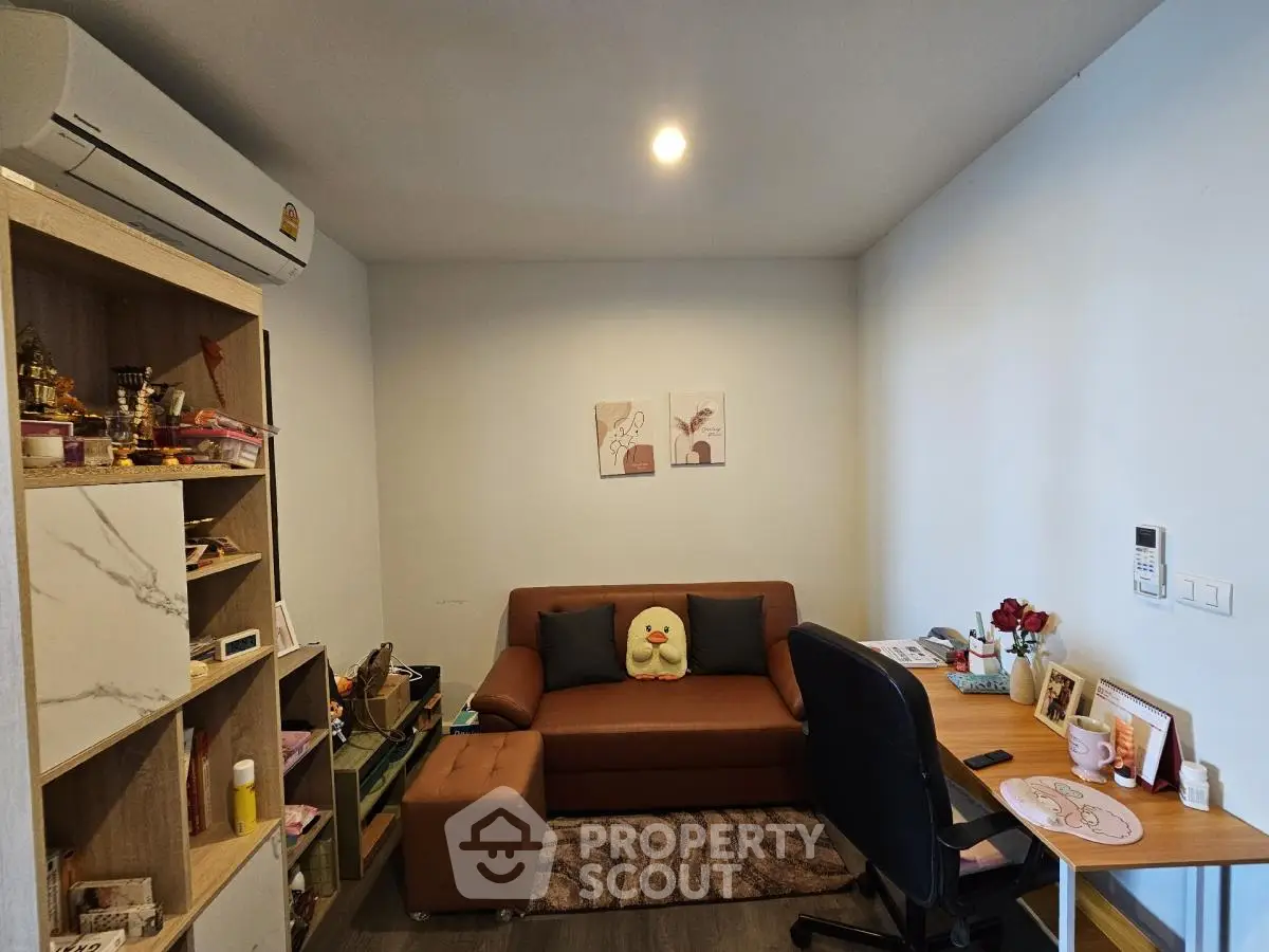 Cozy study room with modern decor and comfortable seating