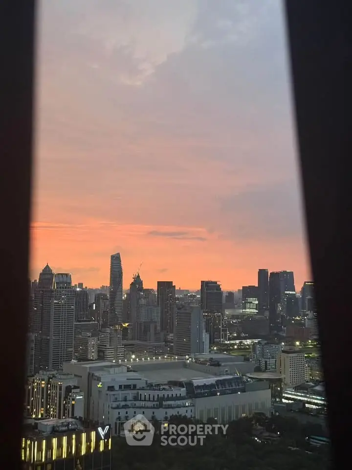 Stunning cityscape view at sunset with modern skyscrapers and vibrant skyline.