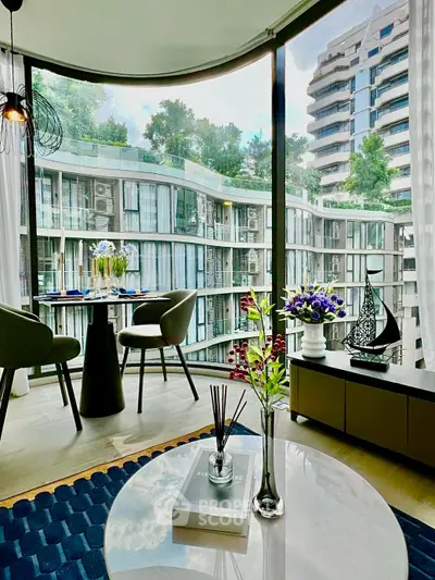 Luxurious modern living room with panoramic city view and elegant decor