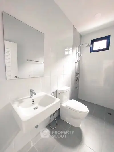 Modern bathroom with sleek fixtures and natural light