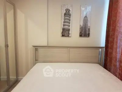 Cozy bedroom with modern decor and mirrored wardrobe