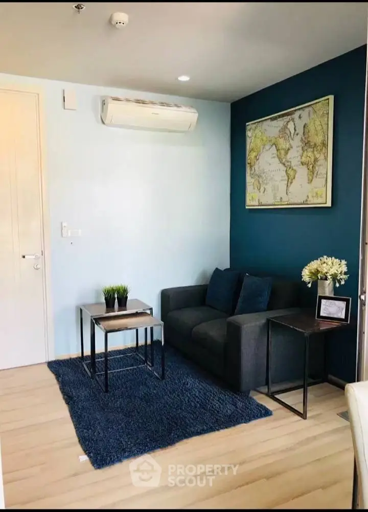 Chic living room with modern decor and world map accent wall