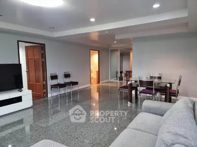 Spacious modern living room with sleek furniture and open layout