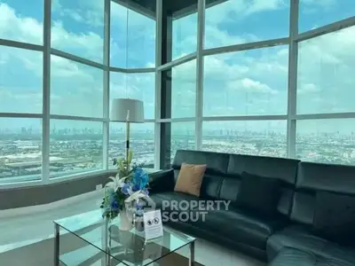 Luxurious corner unit living room with panoramic city views and elegant decor