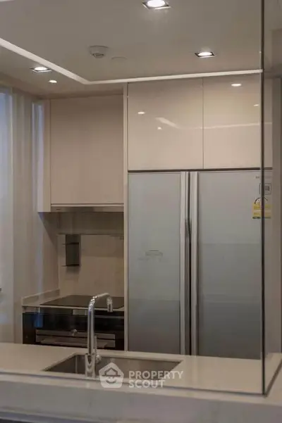 Modern kitchen with sleek appliances and stylish design