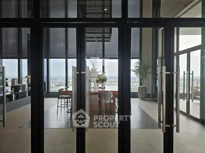 Modern dining area with panoramic city view and elegant decor