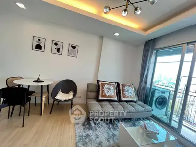 Modern living room with stylish decor and city view balcony