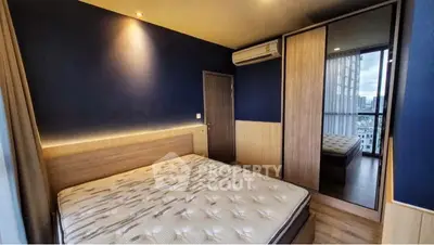 Modern bedroom with stylish wooden furniture and city view