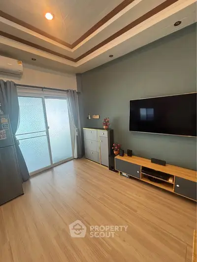 Modern living room with sleek TV setup and stylish decor