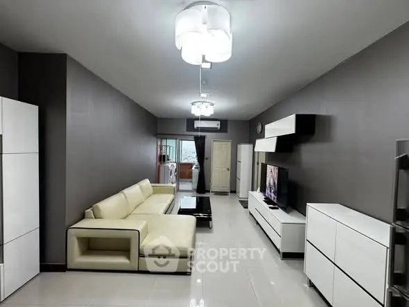 Modern living room with sleek furniture and stylish lighting