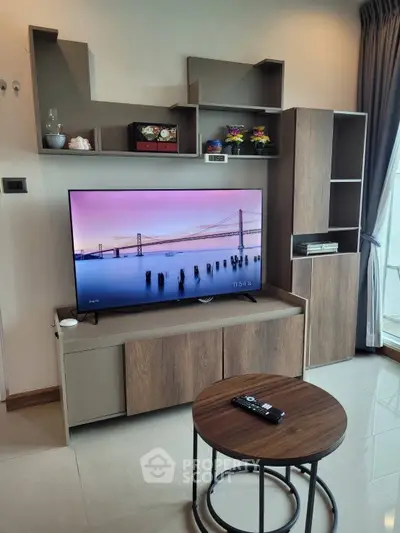 Modern living room with stylish TV unit and elegant decor