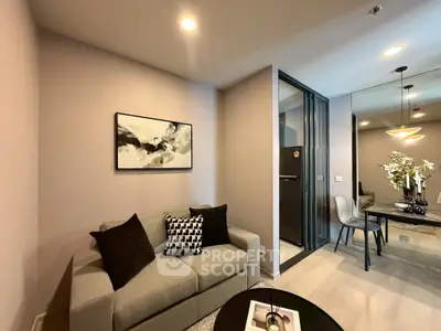 Modern living room with stylish decor and open dining area