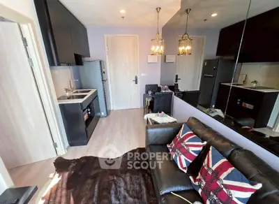 Modern living room with stylish decor and open kitchen layout