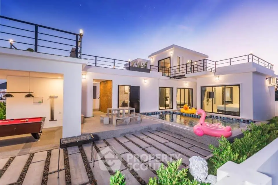 Luxurious modern villa with private pool and rooftop terrace, perfect for entertaining and relaxation.