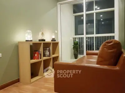 Cozy living room with leather sofa and modern decor