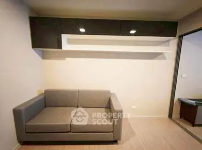 Modern living room with sleek sofa and minimalist shelving