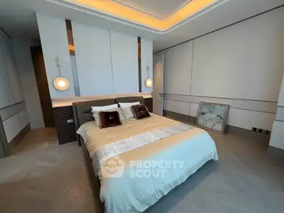 Luxurious modern bedroom with elegant lighting and stylish decor