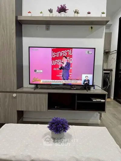 Modern living room with sleek TV setup and stylish decor