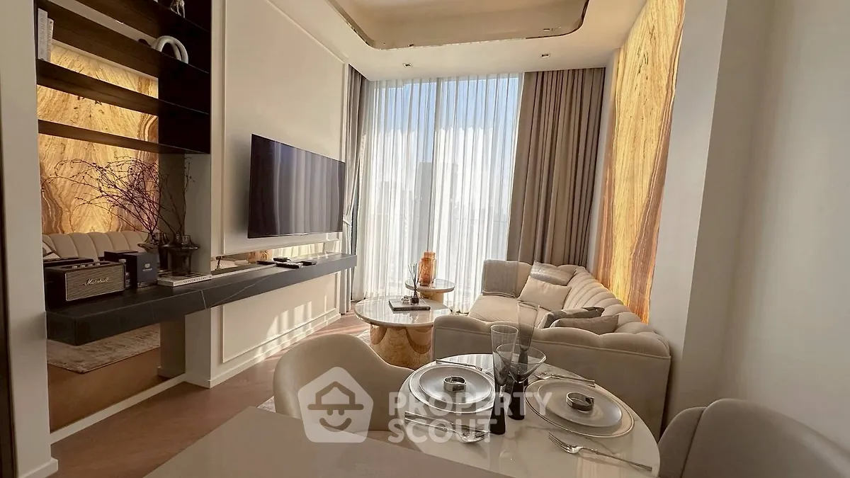 Luxurious modern living room with elegant decor and large windows