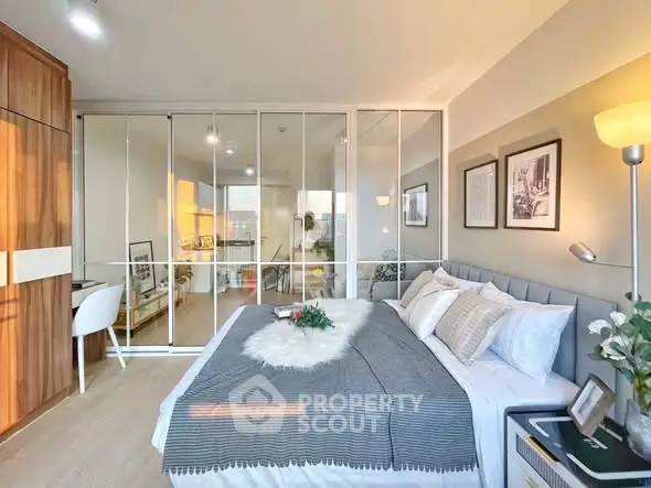 Modern bedroom with glass partition and cozy decor